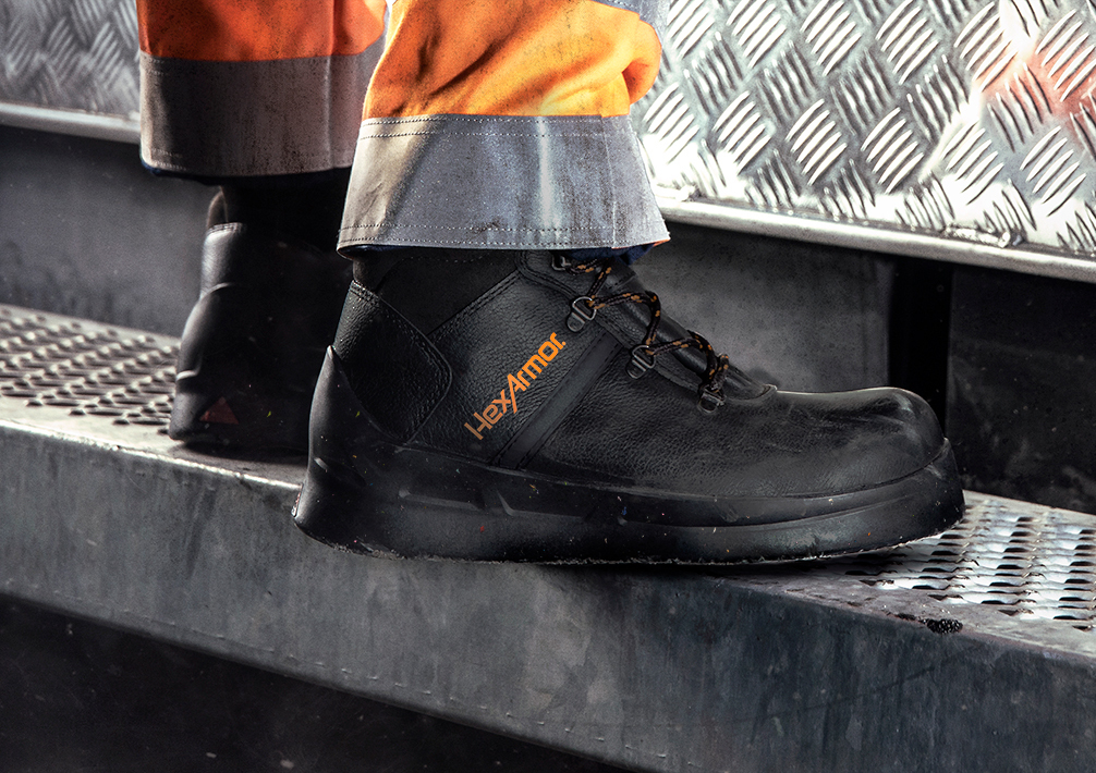 View of the Asphalt boots being worn by a worker to emphasize the stylish look combined with protective features.
