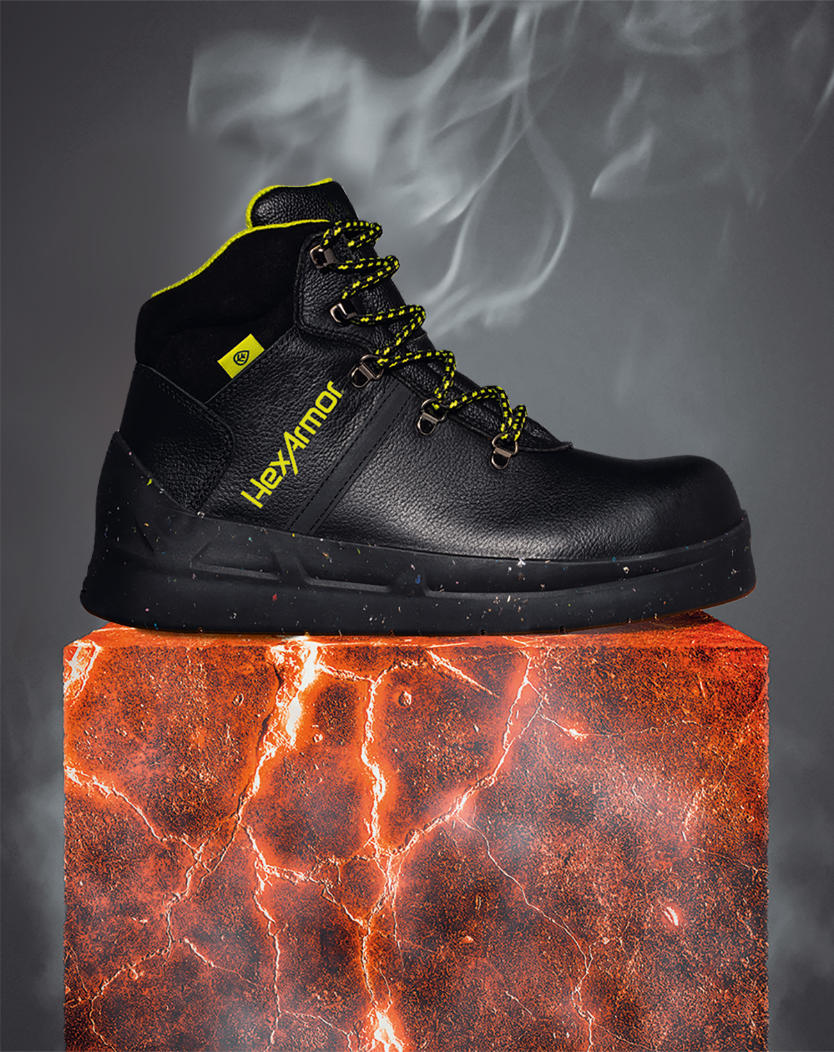 Side view of HexArmor’s asphalt footwear resting on top of sizzling asphalt-like material to showcase heat resistance.