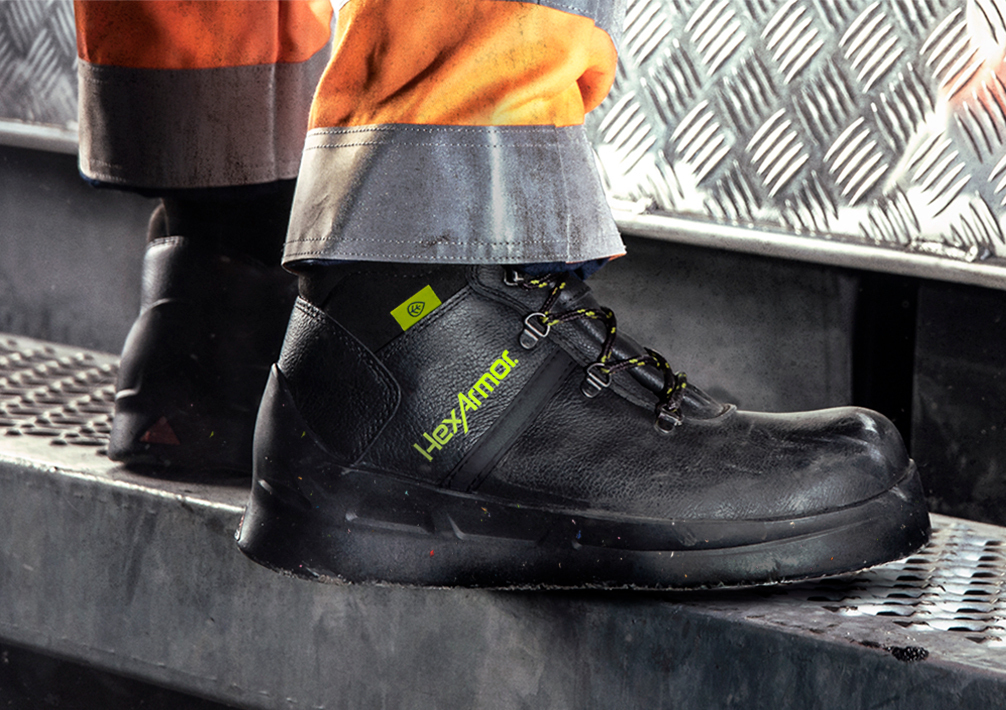 View of the Asphalt boots being worn by a worker to emphasize the stylish look combined with protective features.