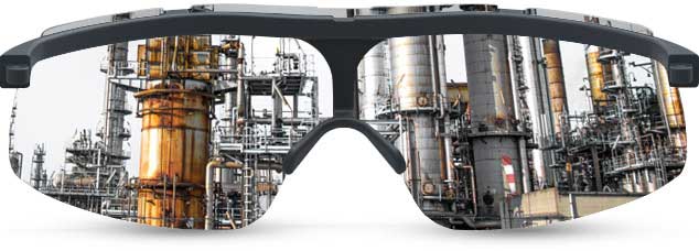 Clear view of industrial plant through safety glasses with anti-fog coating.