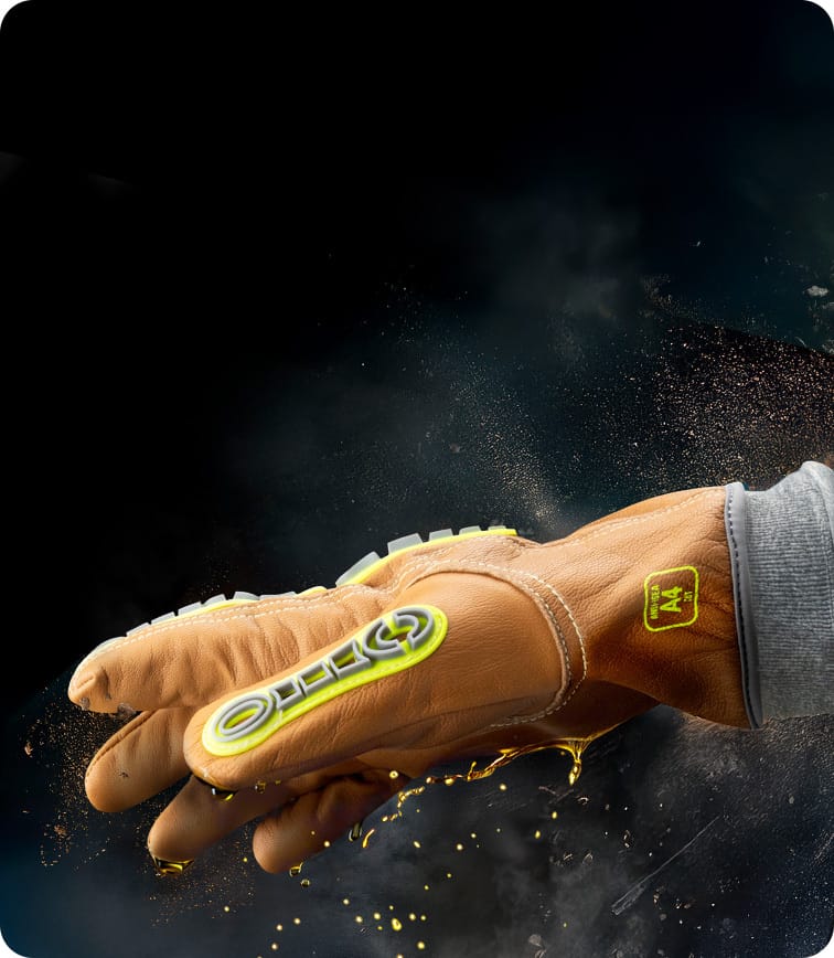 Oil rig worker wearing the 5071IMP leather work gloves while gripping an oil pipe.