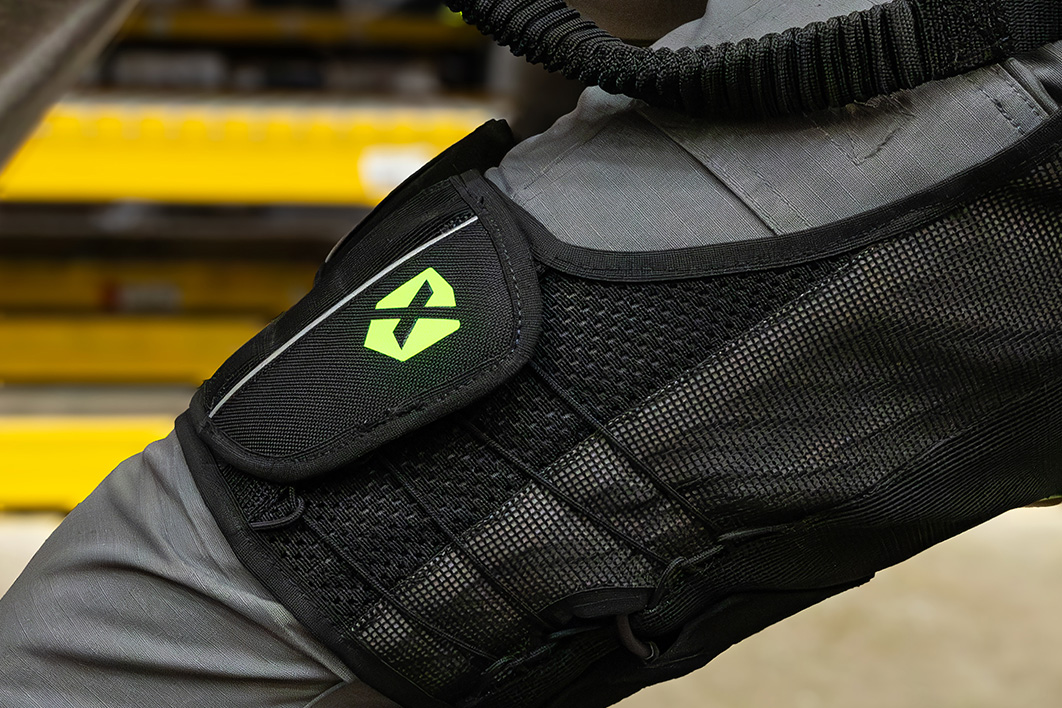 Close-up of a SafeLift™ exosuit thigh strap and sensor.