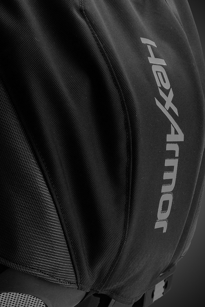 Detail of the SafeLift™ exosuit fabric with HexArmor branding.