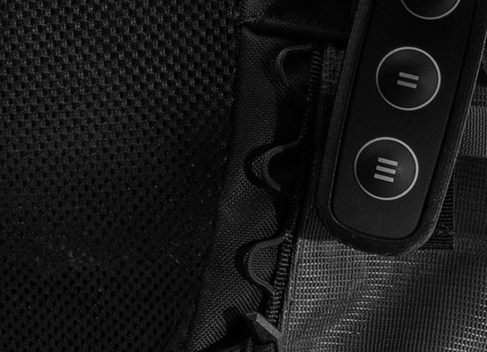 Close-up of the SafeLift™ exosuit control buttons.